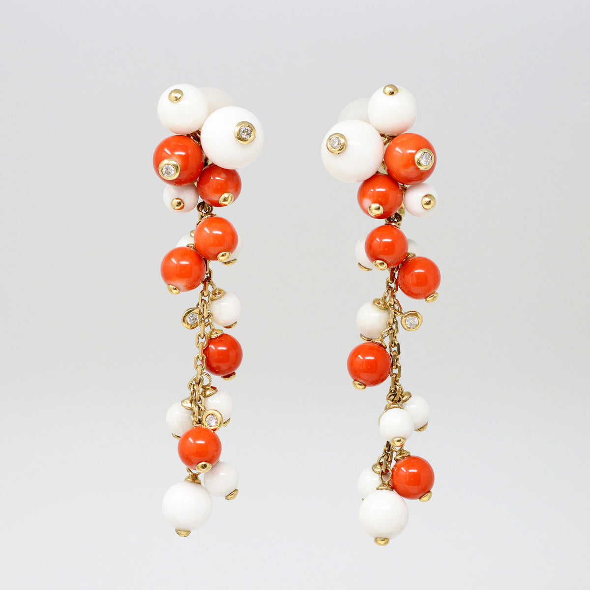 talian Coral, White Agate Beads and Diamonds Dangling Earrings in 18 Karat Gold with light background