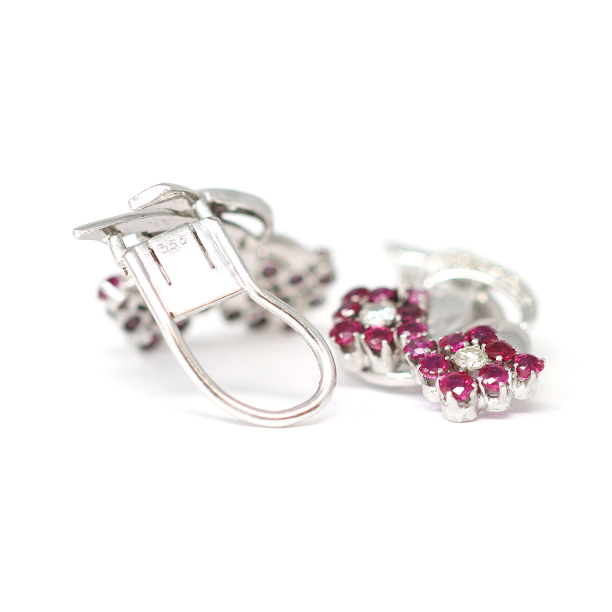 Platinum Ruby and Diamond Flower Clip-On Earrings, circa 1950 hallmarks view