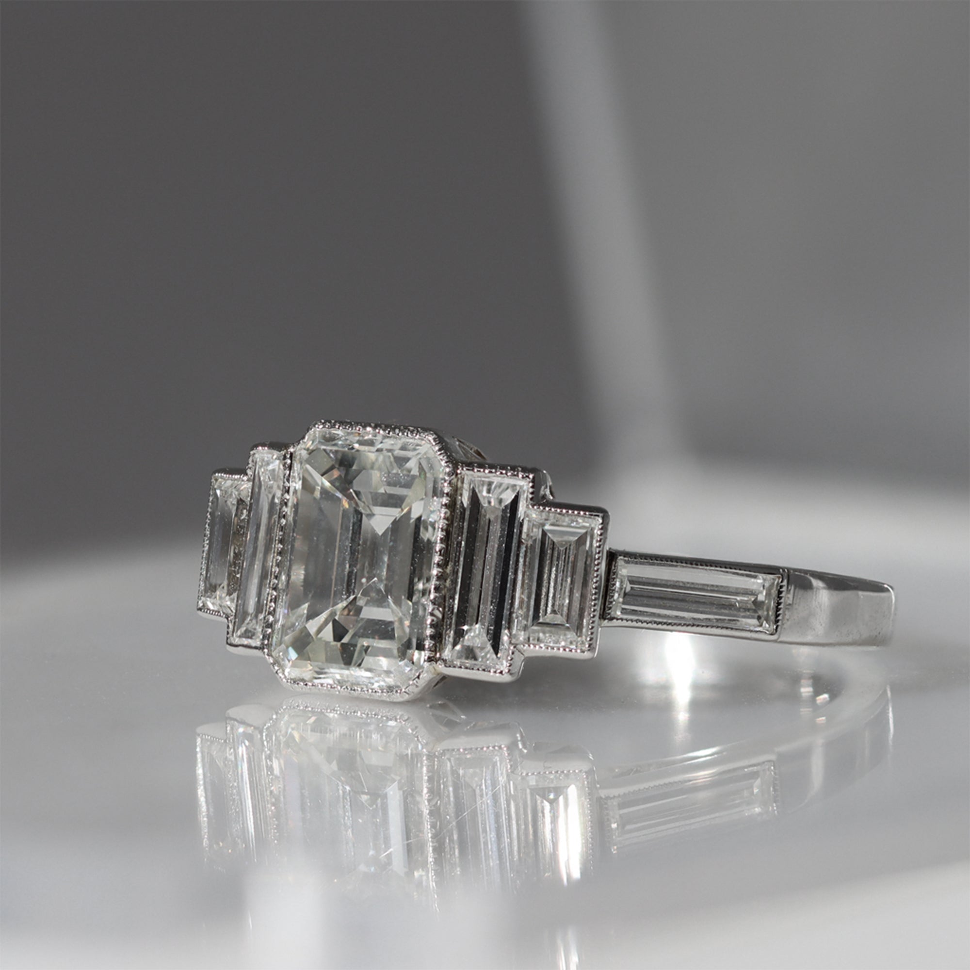 Emerald Cut Diamond Ring With Pear Shape Side Diamonds | ADN – Australian  Diamond Network