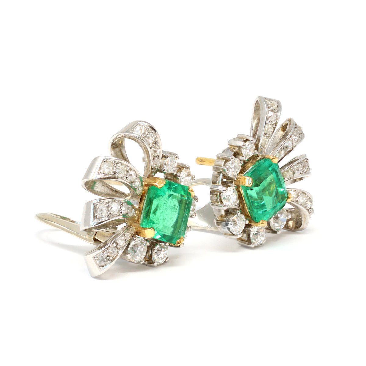 Pair of Emerald and Diamond Clip on Earrings in Platinum, Circa 1940 angle view