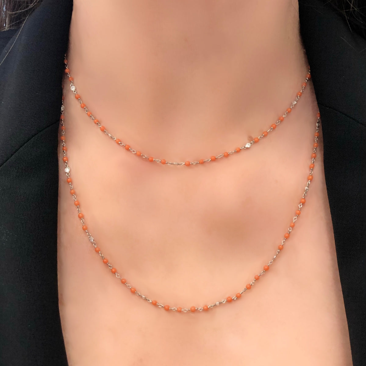 Rosaria-Varra-handmade-platinum-diamond-and-coral-bead-opera-necklace-model-2-view-2000x2000
