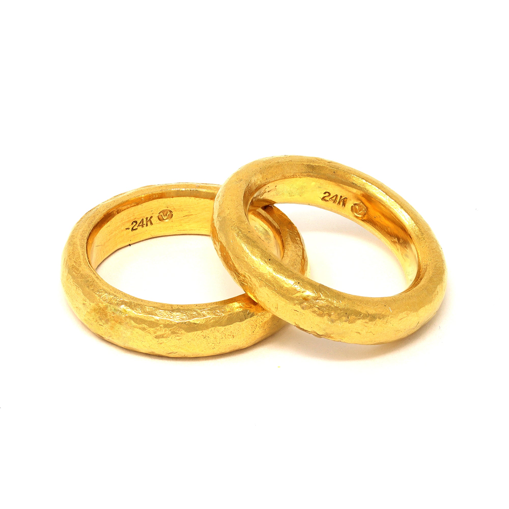 A Pair of Rosaria Varra 24 Karat Gold Handmade Band Rings